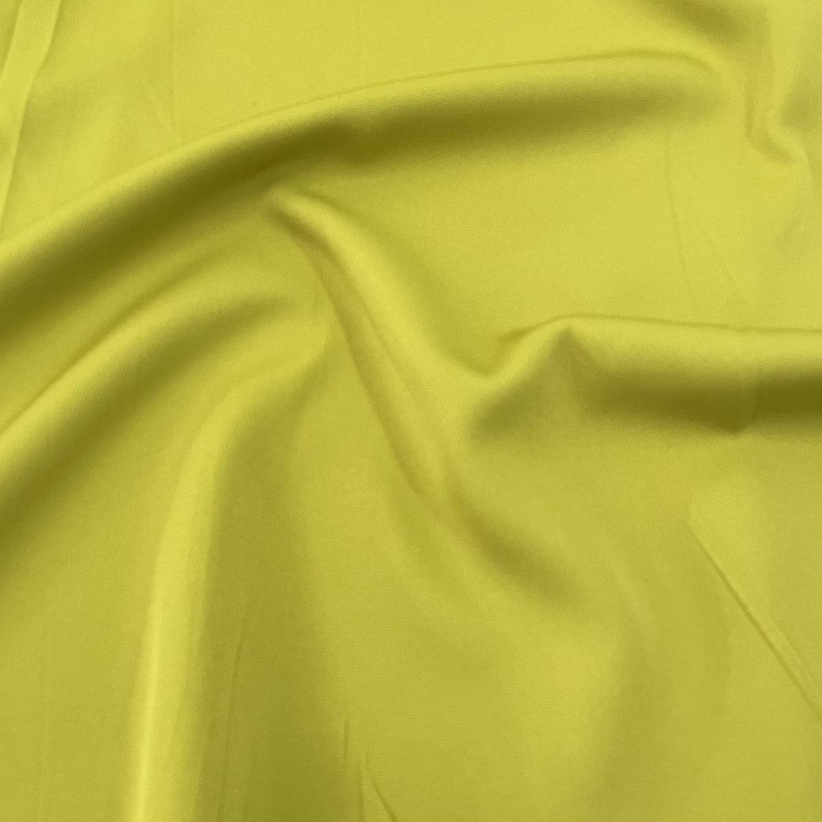 Exclusive Lemon Green Solid Banana Crepe Fabric - Design For Destiny