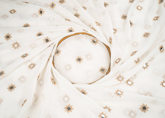 White Georgette Dyeable Fabric With All Over Buti Of Golden Zari And Faux Mirror Work PG 22409 - Design For Destiny