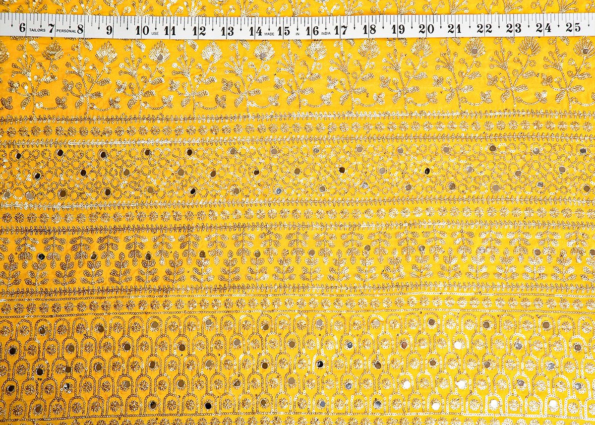 Yellow Silk Fabric with All Over Sequins and Mirror Work and One Side Heavy Border PG 16048 - Design For Destiny