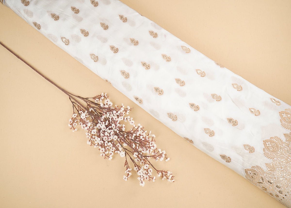 White Dyeable Silk Fabric with Allover Zari Handloom and One-Side Border PG 19705 - Design For Destiny